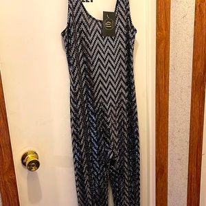 Shimmering Jumpsuit with flared leg detail. Large, silver.